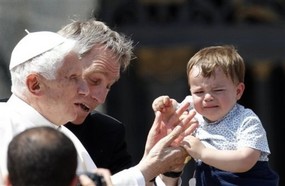 cranky child and Pope May 2 2012.jpg